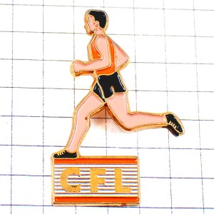 ピンバッジ・ランナー陸上選手ランニングCFLオレンジ色のランニングシャツ