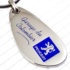 キーホルダー・プジョー紺色シルバーロゴ銀色エンブレムのライオン PEUGEOT FRANCE