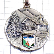 キーホルダー・アルプスの山小屋シャレー鹿の紋章シルバー銀色