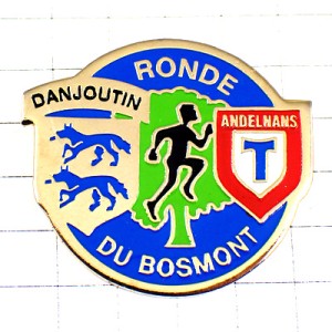 ピンバッジ・走る人と狼やＴの紋章 RONDE-DU-BOSMONT FRANCE
